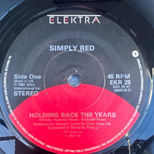 Simply red holding back - simply,